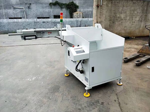 送料機